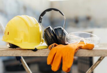 front-view-protective-glasses-with-hard-hat-headphones